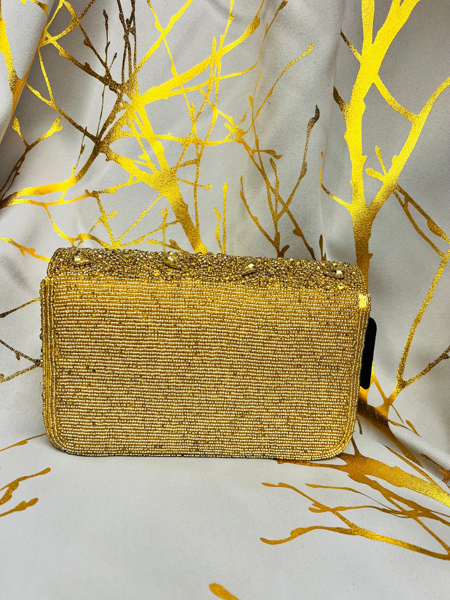 Mini gold handbag