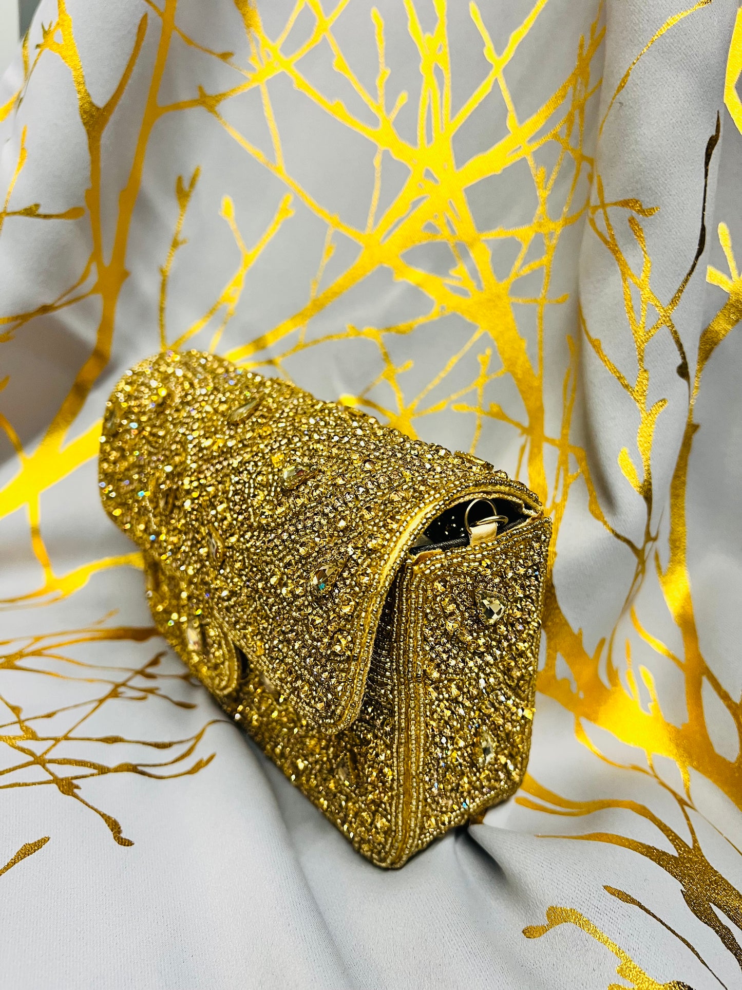 Mini gold handbag