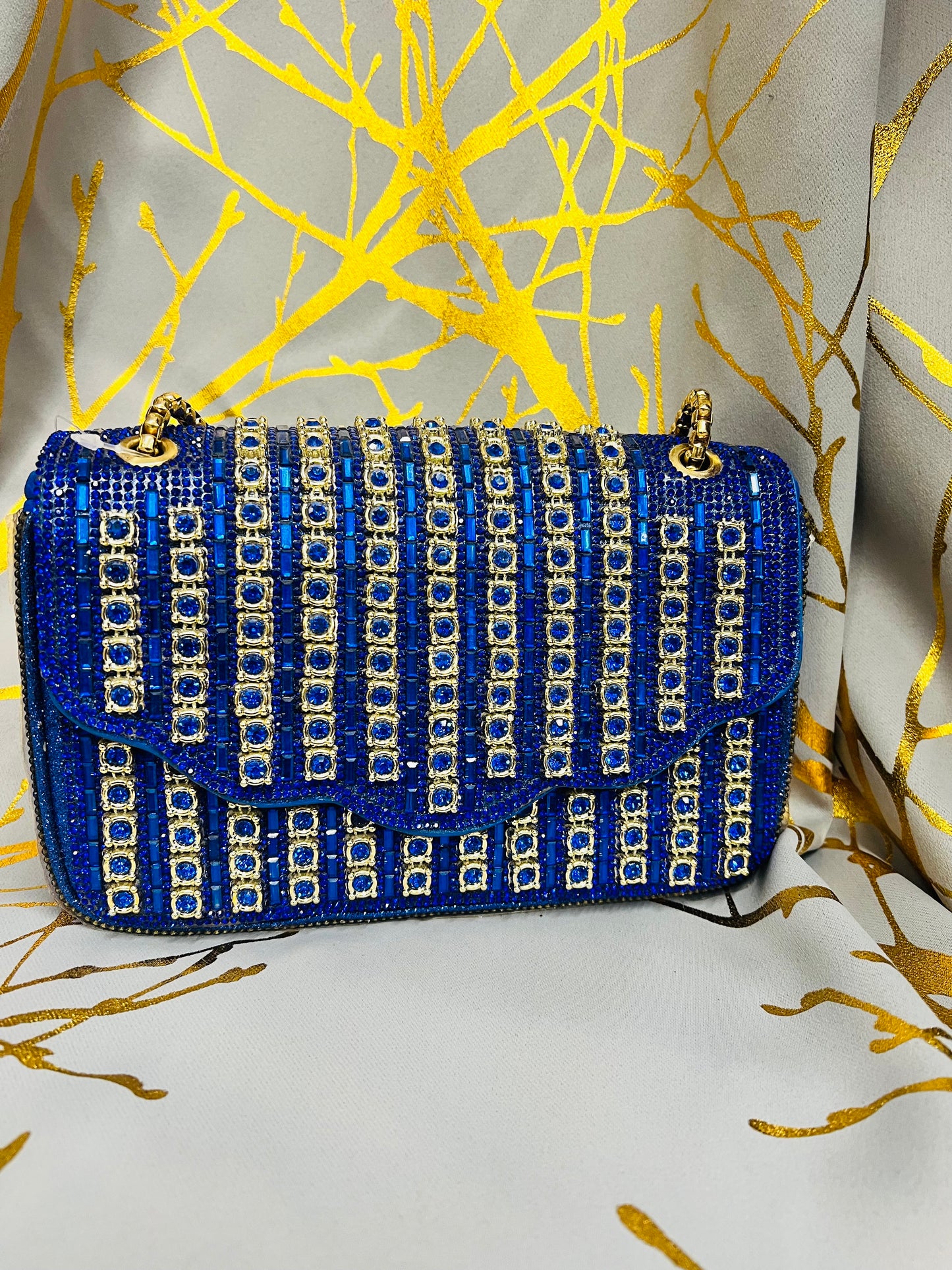 Blue and gold handbag