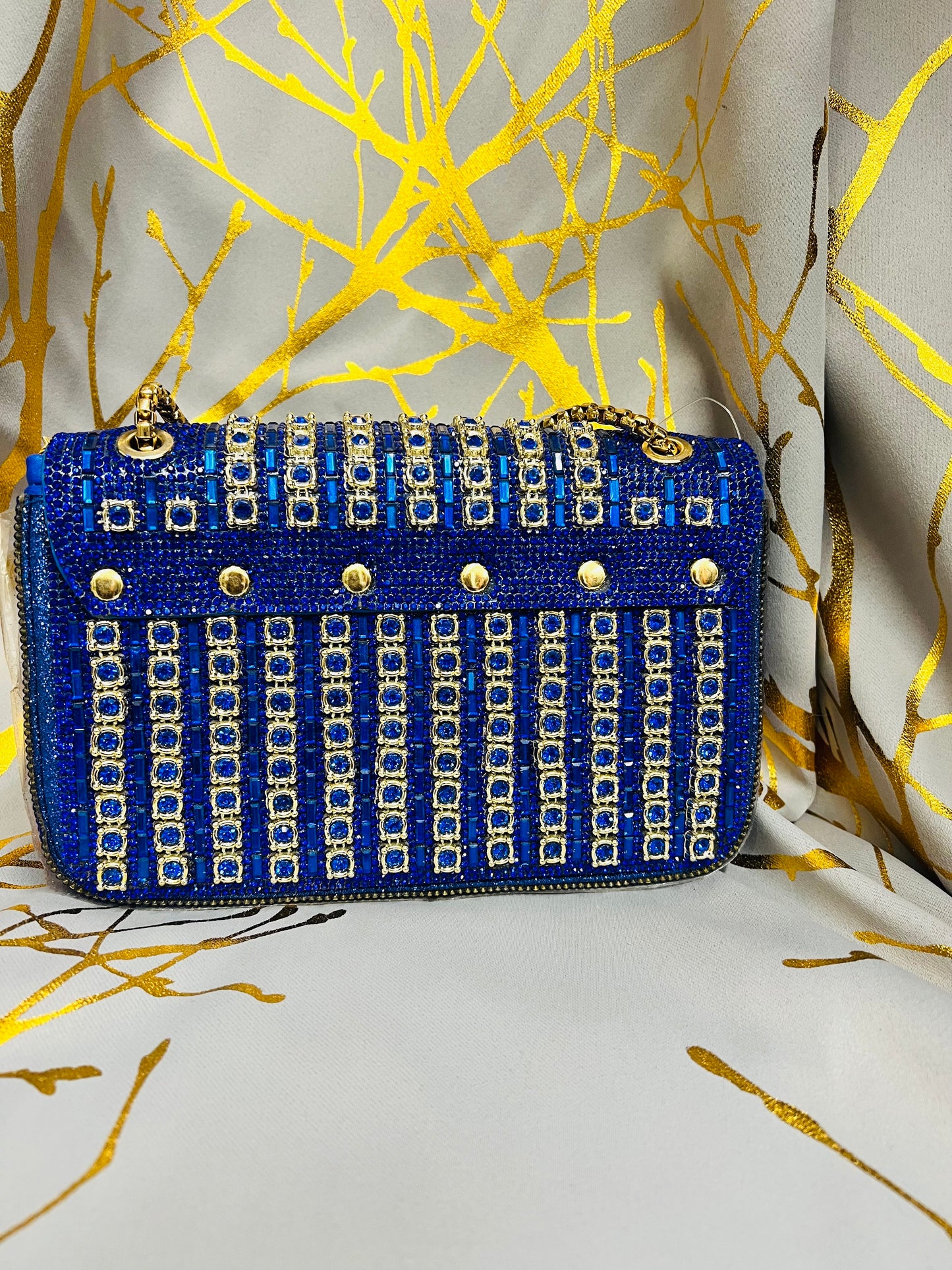 Blue and gold handbag