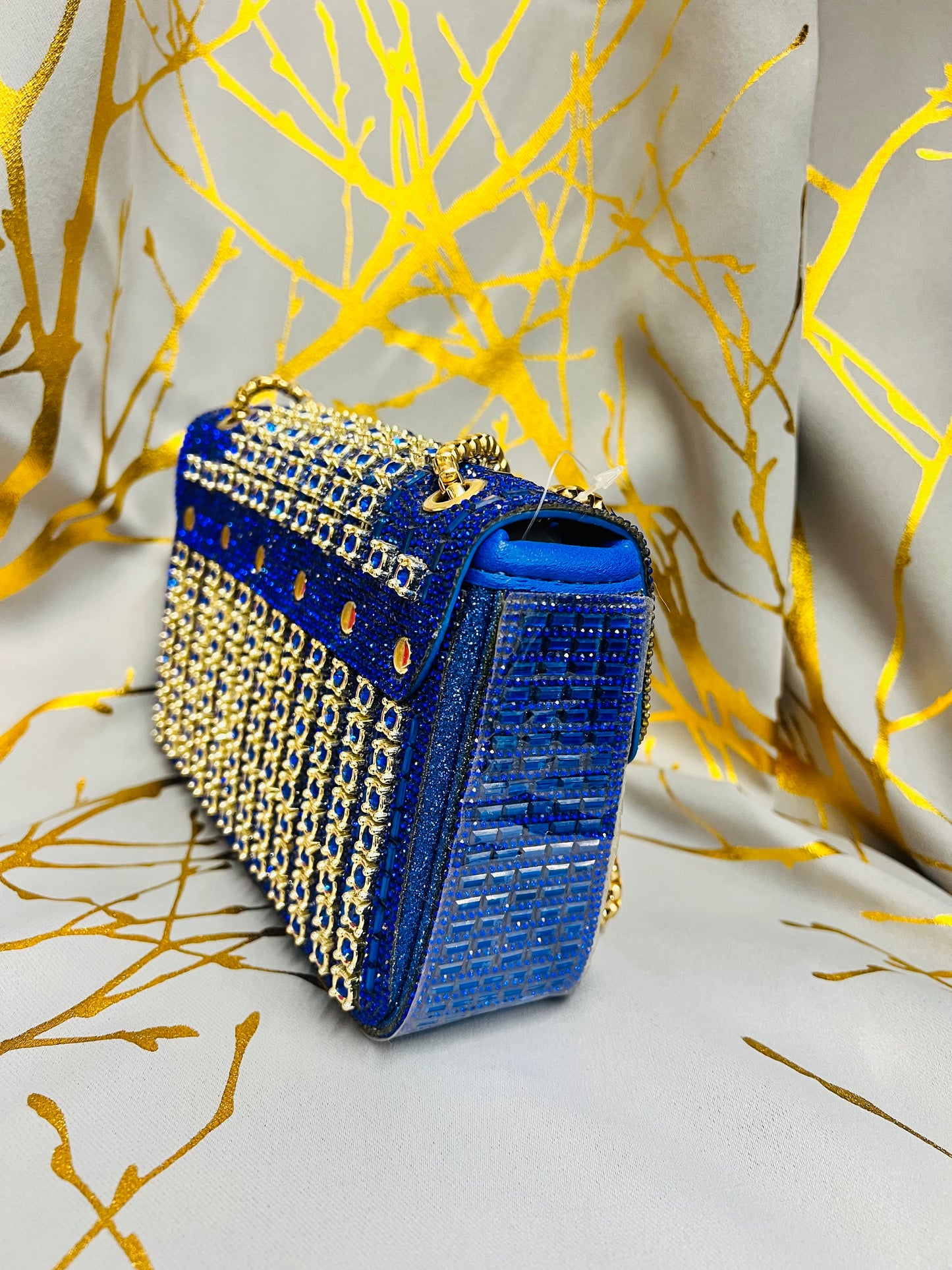 Blue and gold handbag