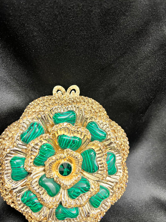 Green and gold clutch