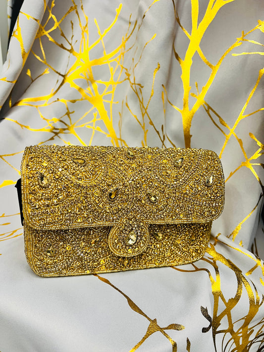 Mini gold handbag