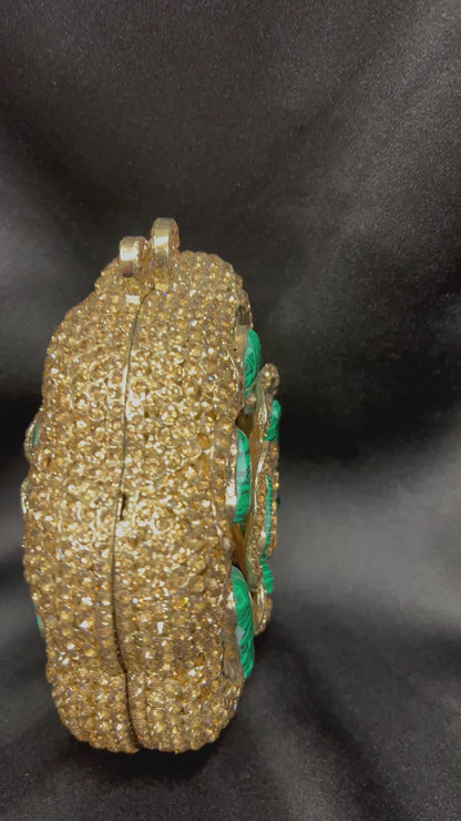Green and gold clutch